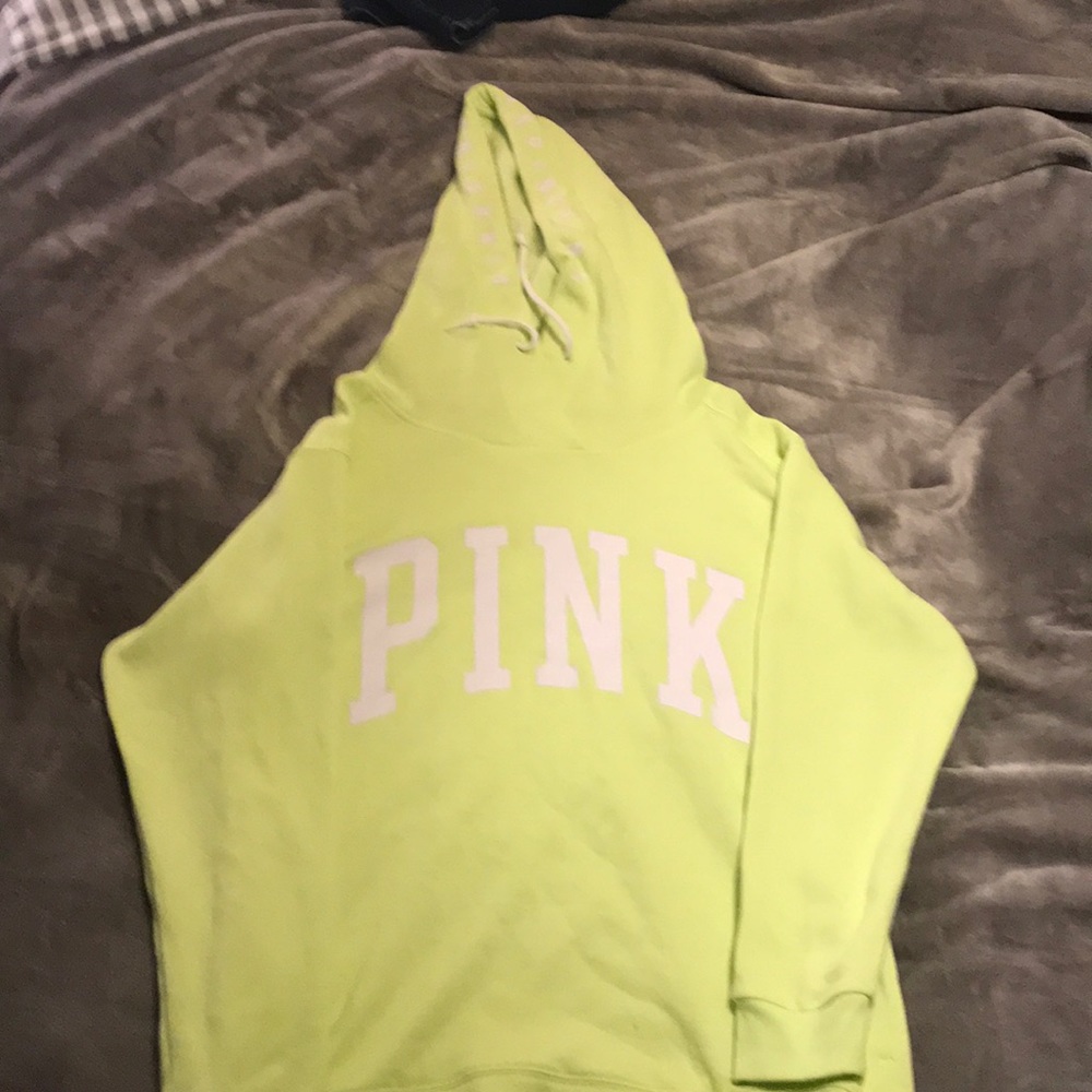Yellow pull over with white wording